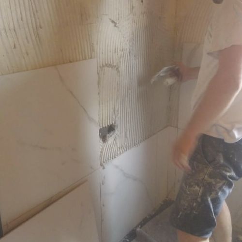 Rivestimento a parete in Gres porcellanato   Installazione box doccia e accessori, finitura siliconatura e collaudo